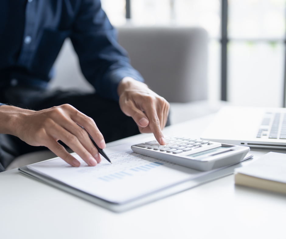 Image of person with calculator